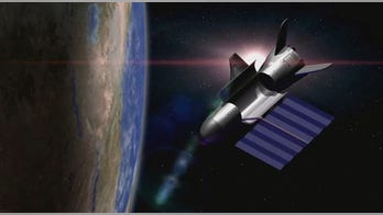 Air Force's X-37B space plane mystery mission wings by 500 days in orbit