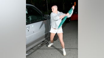 Paparazzo auctioning off umbrella used by Britney Spears in 2007 attack