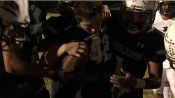 Quarterback severely injured in boating accident scores touchdown with help of teammates