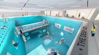 Into the blue: Pool has a depth equivalent to a 12-story building