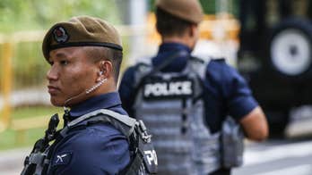 Fearsome Nepalese police offer security for Trump-Kim summit