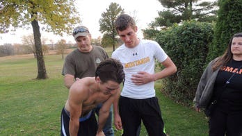 Champion teen runner disqualified after helping rival in medical distress