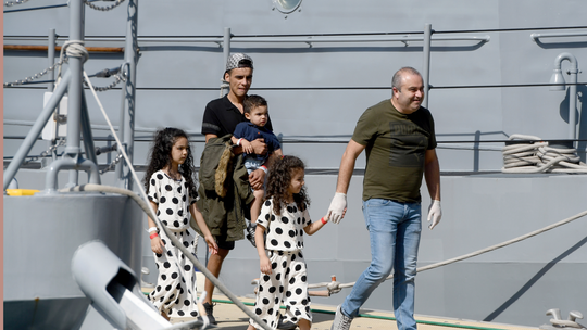 The Latest: Migrants delayed by bad weather reach Malta