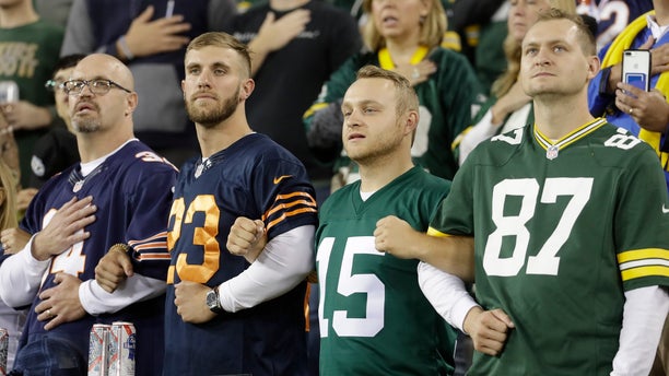 packers bears fans stand linked AP