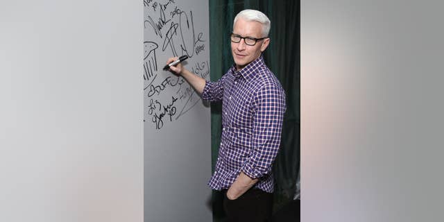 FILE - In this April 15, 2016 file photo, CNN News anchor Anderson Cooper appears at AOL's BUILD Speaker Series to discuss the HBO documentary, "Nothing Left Unsaid", at AOL Studios in New York. Cooper's name has been circulating as a possible replacement for Michael Strahan on the morning talk show, "Live! With Kelly and Michael." Strahan, who started in 2012, is leaving to work full-time at "Good Morning America" and ABC announced that his last day will be on May 13. (Photo by Evan Agostini/Invision/AP, File)