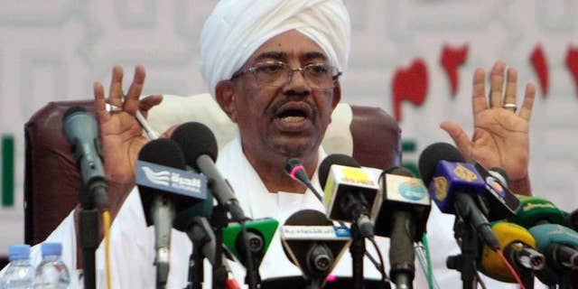 Sudanese President Omar al-Bashir speaks during a press conference in Khartoum late on September 22, 2013