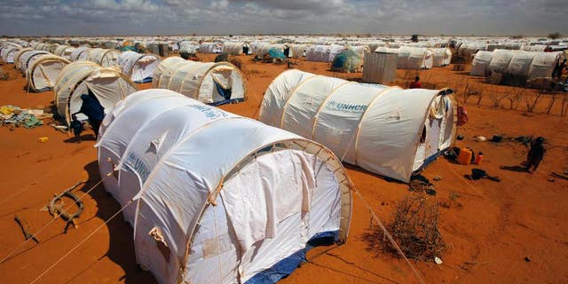 FILE - In this Friday, Aug. 5, 2011, file photo, tents are seen at the UNHCR's Ifo Extension camp outside Dadaab, eastern Kenya 62 miles from the Somali border.(AP Photo/Jerome Delay, File)
