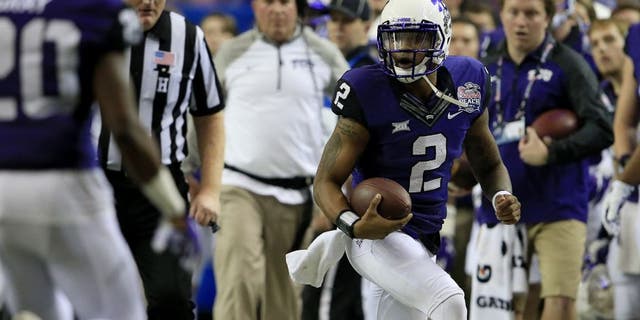 Dec 31, 2014; Atlanta , GA, USA; TCU Horned Frogs quarterback Trevone Boykin (2) runs the ball during the second quarter in the 2014 Peach Bowl against the Mississippi Rebels at the Georgia Dome. Mandatory Credit: Paul Abell/CFA Peach Bowl via USA TODAY Sports