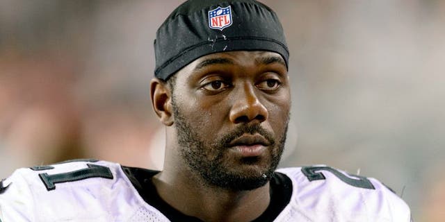 Aug 9, 2013; Philadelphia, PA, USA; Philadelphia Eagles safety Kenny Phillips (21) along the sidelines during the third quarter against the New England Patriots at Lincoln Financial Field. The Patriots defeated the Eagles 31-22. Mandatory Credit: Howard Smith-USA TODAY Sports
