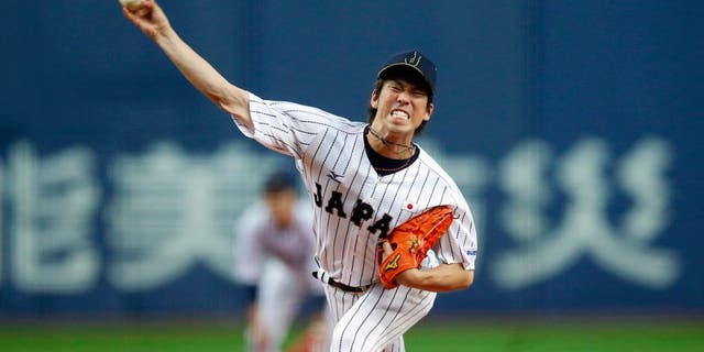 OSAKA, JAPAN - NOVEMBER 12: Kenta Maeda #18 of Samurai Japan pitches in the second inning against the MLB All-Stars at the Kyocera Dome during the Japan All-Star Series on Wednesday, November 12, 2014 in Osaka, Japan. (Photo by Yuki Taguchi/MLB Photos)