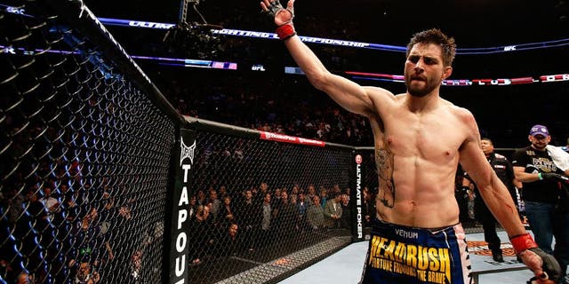 MONTREAL, QC - MARCH 16: Carlos Condit salutes the crowd after his three round battle against Johny Hendricks during the UFC 158 event at Bell Centre on March 16, 2013 in Montreal, Quebec, Canada. (Photo by Josh Hedges/Zuffa LLC/Zuffa LLC via Getty Images)