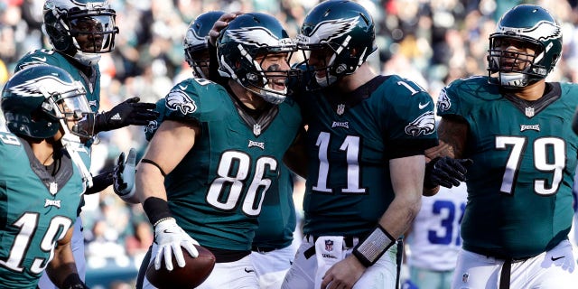 Philadelphia Eagles' Zach Ertz, #86, celebrates his touchdown catch with Carson Wentz during the first half of an NFL football game, Sunday, Jan. 1, 2017, in Philadelphia.