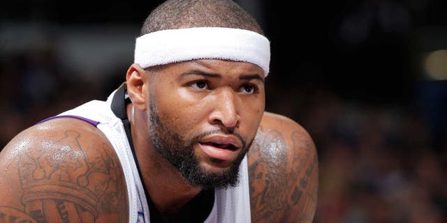 SACRAMENTO, CA - DECEMBER 18: DeMarcus Cousins #15 of the Sacramento Kings looks on during the game against the Milwaukee Bucks on December 18, 2014 at Sleep Train Arena in Sacramento, California. NOTE TO USER: User expressly acknowledges and agrees that, by downloading and or using this photograph, User is consenting to the terms and conditions of the Getty Images Agreement. Mandatory Copyright Notice: Copyright 2014 NBAE (Photo by Rocky Widner/NBAE via Getty Images)