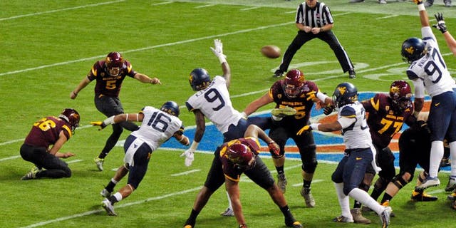 Jan 2, 2016; Phoenix, AZ, USA; Arizona State Sun Devils place kicker Zane Gonzalez (5) kicks a field goal during the first half against the West Virginia Mountaineers at Chase Field during the Cactus Bowl. Mandatory Credit: Matt Kartozian-USA TODAY Sports