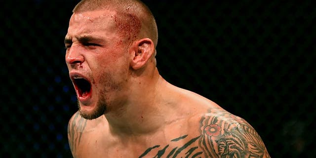 LAS VEGAS, NV - JANUARY 02: Dustin Poirier reacts to his victory over Joe Duffy of Ireland in their lightweight bout during the UFC 195 event inside MGM Grand Garden Arena on January 2, 2016 in Las Vegas, Nevada. (Photo by Josh Hedges/Zuffa LLC/Zuffa LLC via Getty Images)