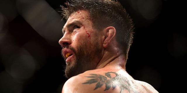 LAS VEGAS, NV - JANUARY 02: Carlos Condit reacts to his loss to Robbie Lawler in their welterweight championship fight during the UFC 195 event inside MGM Grand Garden Arena on January 2, 2016 in Las Vegas, Nevada. (Photo by Brandon Magnus/Zuffa LLC/Zuffa LLC via Getty Images)