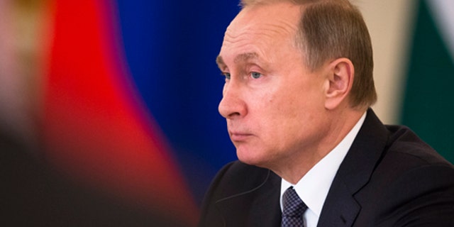 Dec. 24, 2015: Russian President Vladimir Putin attends a meeting with Russian and Indian officials and businessmen during his meeting with Indian Prime Minister Narendra Modi in the Kremlin in Moscow.