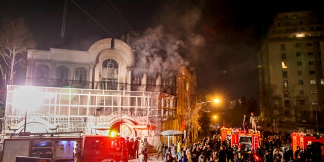 Jan. 3, 2016: Smoke rises as Iranian protesters set fire to the Saudi embassy in Tehran.