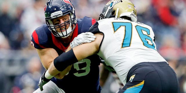 Jan 3, 2016; Houston, TX, USA; Houston Texans defensive end J.J. Watt (99) rushes against Jacksonville Jaguars tackle Luke Joeckel (76) during the game at NRG Stadium. Houston won 30-6. Mandatory Credit: Kevin Jairaj-USA TODAY Sports