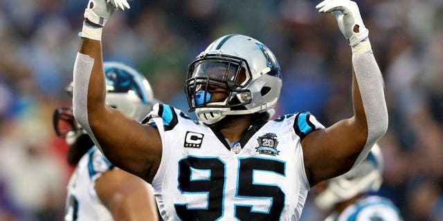 CHARLOTTE, NC - JANUARY 03: Charles Johnson #95 of the Carolina Panthers celebrates during their NFC Wild Card Playoff game against the Arizona Cardinals at Bank of America Stadium on January 3, 2015 in Charlotte, North Carolina. (Photo by Streeter Lecka/Getty Images)