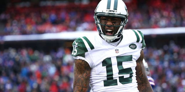 ORCHARD PARK, NY - JANUARY 03: Brandon Marshall #15 of the New York Jets celebrates a touchdown catch against the Buffalo Bills during the first half at Ralph Wilson Stadium on January 3, 2016 in Orchard Park, New York. (Photo by Tom Szczerbowski/Getty Images)