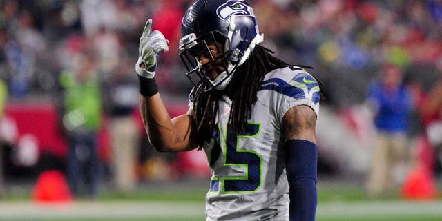 Jan 3, 2016; Glendale, AZ, USA; Seattle Seahawks cornerback Richard Sherman (25) reacts during the second half against the Arizona Cardinals at University of Phoenix Stadium. Mandatory Credit: Matt Kartozian-USA TODAY Sports