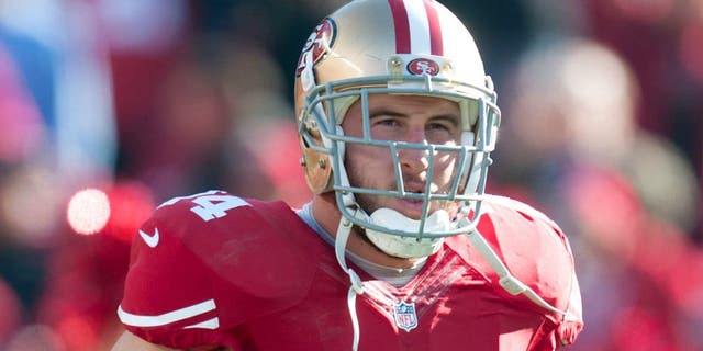 Dec 28, 2014; Santa Clara, CA, USA; San Francisco 49ers tackle Joe Staley (74) runs onto the field before the game against the Arizona Cardinals at Levi's Stadium. Mandatory Credit: Ed Szczepanski-USA TODAY Sports