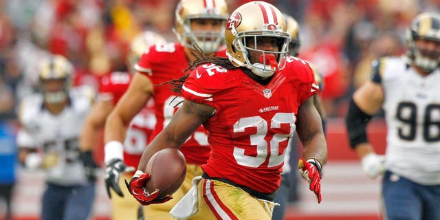 Jan 3, 2016; Santa Clara, CA, USA; San Francisco 49ers running back DuJuan Harris (32) carries the ball against the St. Louis Rams in the second quarter at Levi's Stadium. Mandatory Credit: Cary Edmondson-USA TODAY Sports