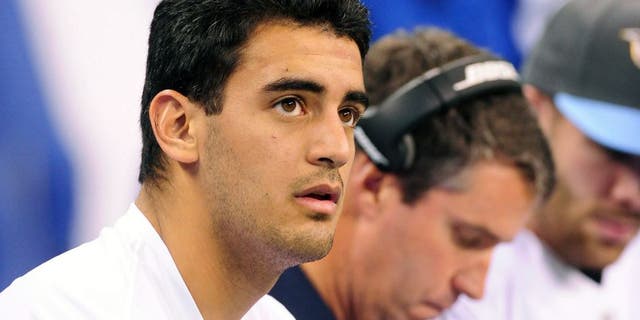 Jan 3, 2016; Indianapolis, IN, USA; Tennessee Titans quarterback Marcus Mariota (8) watches from the sidelines against the Indianapolis Colts at Lucas Oil Stadium. Mandatory Credit: Thomas J. Russo-
