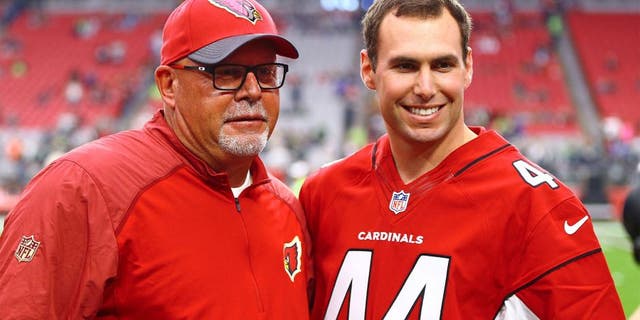 Jan 3, 2016; Glendale, AZ, USA; Arizona Diamondbacks first baseman Paul Goldschmidt (right) with Arizona Cardinals head coach Bruce Arians prior to the game against the Seattle Seahawks at University of Phoenix Stadium. Mandatory Credit: Mark J. Rebilas-USA TODAY Sports