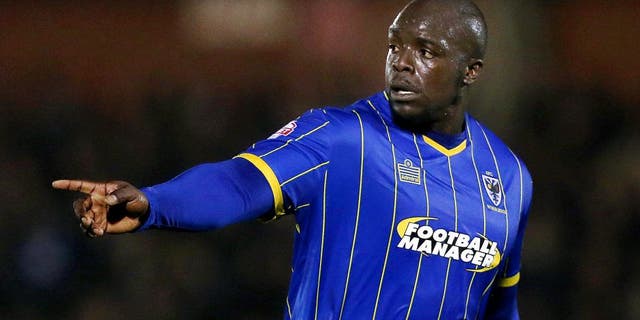 Football - AFC Wimbledon v York City - FA Cup First Round Replay - Cherry Red Records Fans Stadium, Kingsmeadow - 18/11/14 AFC Wimbledon's Adebayo Akinfenwa Mandatory Credit: Action Images / Peter Cziborra Livepic EDITORIAL USE ONLY. No use with unauthorized audio, video, data, fixture lists, club/league logos or "live" services. Online in-match use limited to 45 images, no video emulation. No use in betting, games or single club/league/player publications. Please contact your account representative for further details.