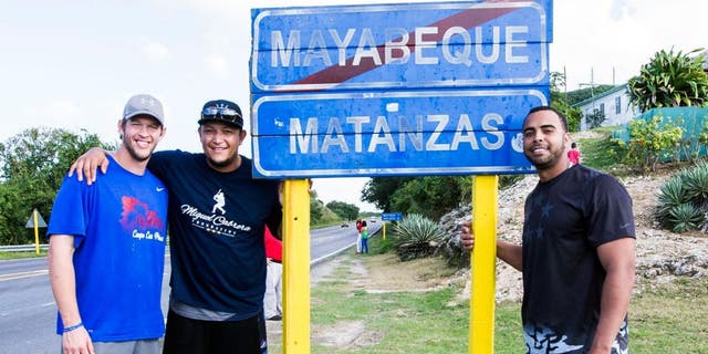 MATANZAS, CUBA - DECEMBER 17: Clayton Kershaw of the Los Angeles Dodgers, Miguel Cabrera of the Detroit Tigers, and Nelson Cruz of the Seattle Mariners pose for a photo on their way to a youth baseball clinic during an MLB goodwill tour on December 17, 2015 at Estadio Victoria de Giron in Matanzas, Cuba. (Photo by Rob Tringali/MLB Photos via Getty Images)