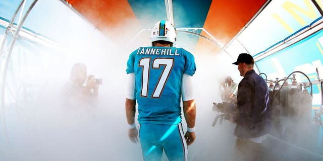 MIAMI GARDENS, FL - JANUARy 03: Ryan Tannehill #17 of the Miami Dolphins prepares to take the field before the game against the New England Patriots at Sun Life Stadium on January 3, 2016 in Miami Gardens, Florida. (Photo by Mike Ehrmann/Getty Images)