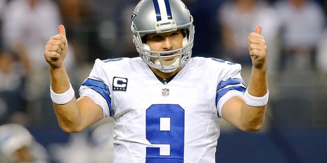 ARLINGTON, TX - JANUARY 04: Tony Romo #9 of the Dallas Cowboys gestures against the Detroit Lions during the second half of their NFC Wild Card Playoff game at AT&T Stadium on January 4, 2015 in Arlington, Texas. (Photo by Tom Pennington/Getty Images)