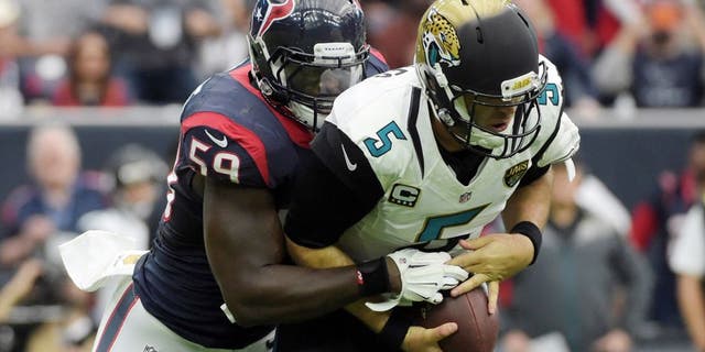 Jan 3, 2016; Houston, TX, USA; Houston Texans outside linebacker Whitney Mercilus (59) sacks Jacksonville Jaguars quarterback Blake Bortles (5) during an NFL football game at NRG Stadium. Mandatory Credit: Kirby Lee-USA TODAY Sports