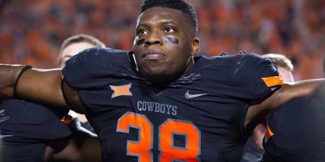 Nov 7, 2015; Stillwater, OK, USA; Oklahoma State Cowboys defensive end Emmanuel Ogbah (38) after the game against the TCU Horned Frogs at Boone Pickens Stadium. OSU won 49-29. Mandatory Credit: Rob Ferguson-USA TODAY Sports