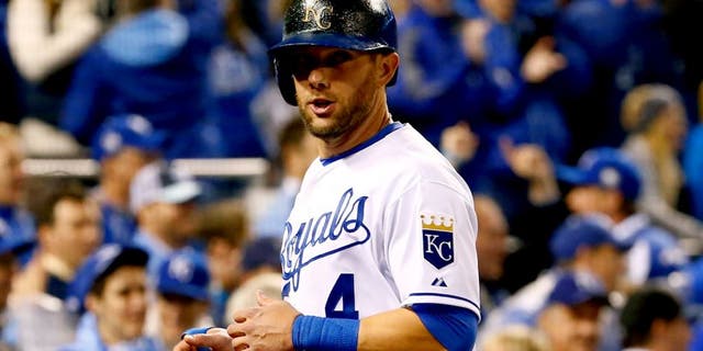 KANSAS CITY, MO - OCTOBER 28: Alex Gordon #4 of the Kansas City Royals reacts after scoring a run on an RBI single hit by Alcides Escobar #2 of the Kansas City Royals (not pictured) in the fifth inning against the New York Mets in Game Two of the 2015 World Series at Kauffman Stadium on October 28, 2015 in Kansas City, Missouri. (Photo by Jamie Squire/Getty Images)