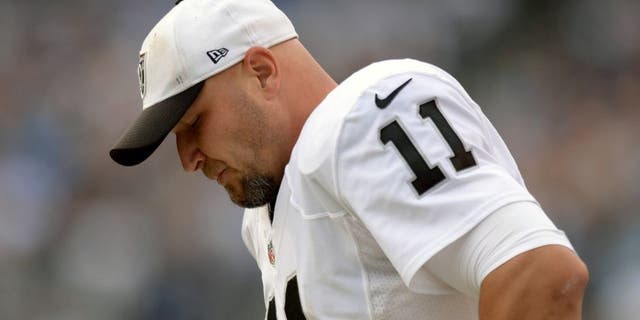 Oct 25, 2015; San Diego, CA, USA; Oakland Raiders kicker Sebastian Janikowski (11) looks on during the fourth quarter against the San Diego Chargers at Qualcomm Stadium. Mandatory Credit: Jake Roth-USA TODAY Sports
