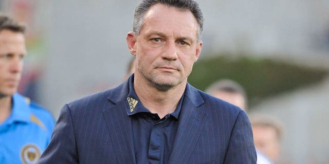 May 19, 2012; Frisco, TX, USA; Philadelphia Union head coach Piotr Nowak leads his team on the field to face the FC Dallas at FC Dallas Stadium. FC Dallas and Philadelphia Union ended tied 1-1. Mandatory Credit: Jerome Miron-USA TODAY Sports