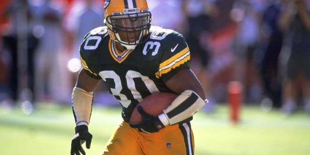 24 Sep 2000: Ahman Green #30 of the Green Bay Packers runs with the ball during the game against the Arizona Cardinals at the Sun Devil Stadium in Tempe, Arizona. The Packers defeated the Cardinals 29-3.Mandatory Credit: Harry How /Allsport