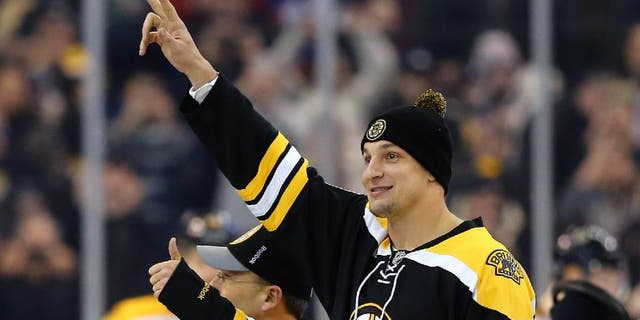 BOSTON, MA - FEBRUARY 07: Rob Gronkowski of the New England Patriots waves to fans before the game between the Boston Bruins and the New York Islanders at TD Garden on February 7, 2015 in Boston, Massachusetts. (Photo by Maddie Meyer/Getty Images)