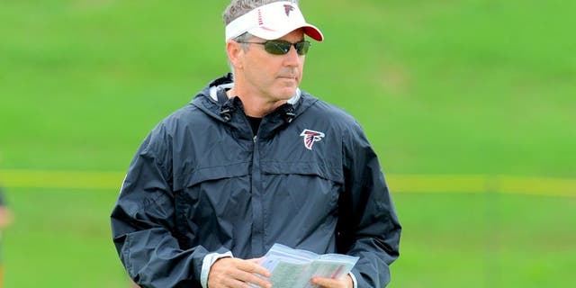 Jun 18, 2013; Flowery Branch, GA, USA; Atlanta Falcons offensive coordinator Dirk Koetter shown on the field during minicamp at the Falcons Training Complex. Mandatory Credit: Dale Zanine-USA TODAY Sports