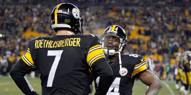 PITTSBURGH, PA - JANUARY 03: Ben Roethlisberger #7 speaks with Antonio Brown #84 of the Pittsburgh Steelers on the bench in the fourth quarter against the Baltimore Ravens during their AFC Wild Card game at Heinz Field on January 3, 2015 in Pittsburgh, Pennsylvania. (Photo by Justin K. Aller/Getty Images)