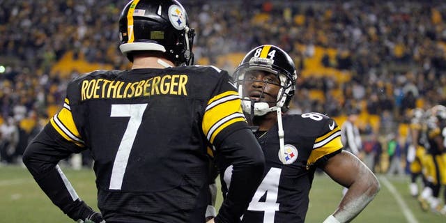 PITTSBURGH, PA - JANUARY 03: Ben Roethlisberger #7 speaks with Antonio Brown #84 of the Pittsburgh Steelers on the bench in the fourth quarter against the Baltimore Ravens during their AFC Wild Card game at Heinz Field on January 3, 2015 in Pittsburgh, Pennsylvania. (Photo by Justin K. Aller/Getty Images)