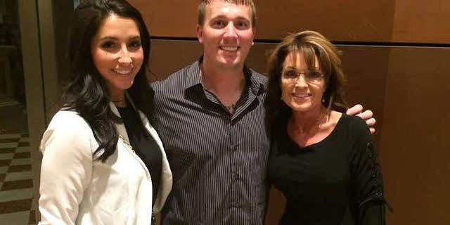Jan. 26, 2015: Bristol Palin and Dakota Meyer pose with Sarah Palin.