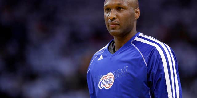 FILE - This Jan. 2, 2013, file photo shows Los Angeles Clippers' Lamar Odom during an NBA basketball game against the Golden State Warriors in Oakland, Calif.