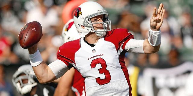 OAKLAND, CA - AUGUST 30: Carson Palmer #3 of the Arizona Cardinals throws the ball against the Oakland Raiders at O.co Coliseum on August 30, 2015 in Oakland, California. (Photo by Ezra Shaw/Getty Images)