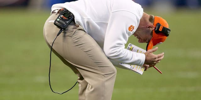 CHARLOTTE, NC - DECEMBER 05: Head coach Dabo Swinney of the Clemson Tigers reacts after a play against the North Carolina Tar Heels during the Atlantic Coast Conference Football Championship at Bank of America Stadium on December 5, 2015 in Charlotte, North Carolina. (Photo by Streeter Lecka/Getty Images)