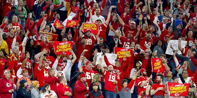 HOUSTON, TX - JANUARY 09: Fans of the Kansas City Chiefs celebrate their 30-0 win over the Houston Texans during the AFC Wild Card Playoff game at NRG Stadium on January 9, 2016 in Houston, Texas. (Photo by Bob Levey/Getty Images)