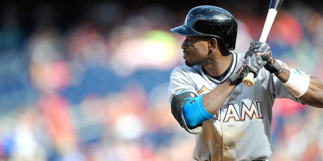 WASHINGTON, DC - SEPTEMBER 20: Dee Gordon #9 of the Miami Marlins bats against the Washington Nationals at Nationals Park on September 20, 2015 in Washington, DC. (Photo by G Fiume/Getty Images)